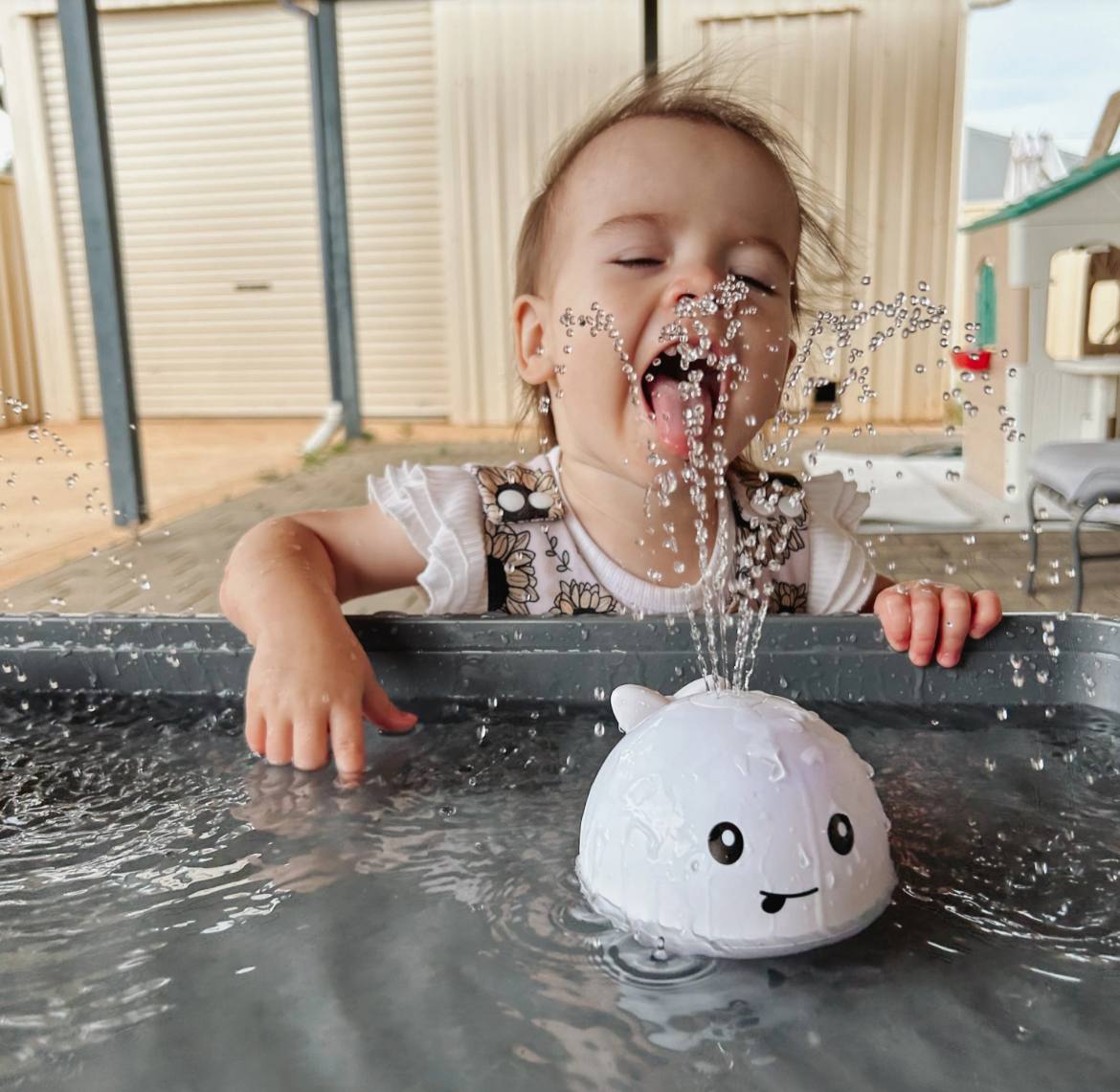 Whale lighting water toy