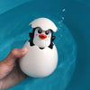 Penguin egg water spray